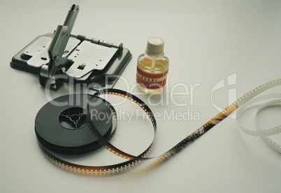 Vintage 8mm moviola cutter with 8mm reel and glue.
