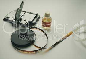 Vintage 8mm moviola cutter with 8mm reel and glue.