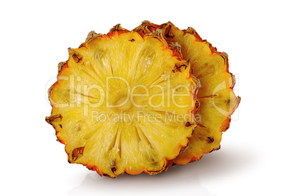 Two slices of pineapple each other isolated on white