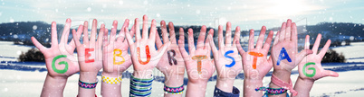 Children Hands Building Word Geburtstag Means Birthday, Snowy Winter Background