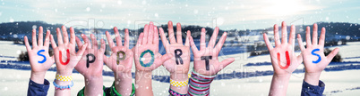 Children Hands Building Word Support Us, Snowy Winter Background