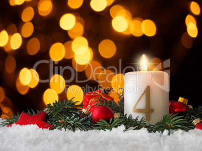 Candle of the fourth Advent burns