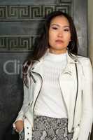 Pretty Asian woman with white jacket. IV