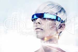 Envisioning the future. Multiple exposure shot of a young woman with VR glasses superimposed on a city at night.