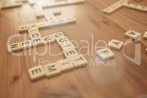 Working words together. Shot of a board game being played without the board.