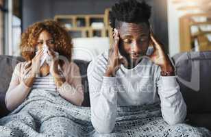 I think youve made me sick now. Shot of a young man getting irritated by his girlfriend suffering with allergies at home.