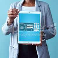 Pay your accounts on your digital tablet. Studio shot of an unrecognizable woman holding a tablet displaying an internet banking webpage against a blue background.