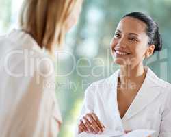 Proud to offer only the best in customer care. Shot of a young woman checking in at the reception desk.