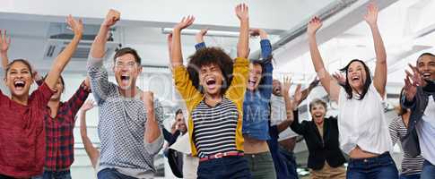 Theres no team like the A-team. Shot of a group of colleagues feeling overjoyed.