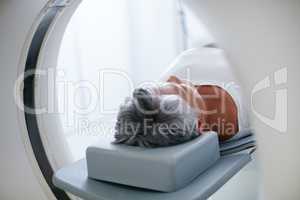 Preventative medical technology. Shot of a senior woman about to have an MRI scan.