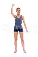 Fitness is mine. Studio portrait of an attractive woman wearing sports clothing looking enthusiastically happy.