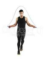 Getting his heart rate going. Studio shot of a young man skipping with a jump rope against a white background.