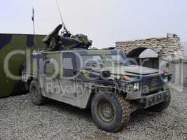 Shot of a military vehicle - This is the real thing from KFOR, Kosovo 1999. This image is part of our historic collection. The digital cameras available back then where very bad, so expect exceptionally bad image quality