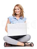 Thinking of a witty reply to his message. Full length shot of a beautiful young woman using her laptop.