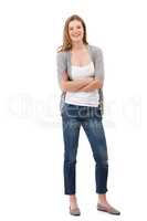 Positively confident. Studio portrait of an attractive young woman standing with her arms folded isolated on white.