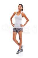 Proud to be in great physical shape. A gorgeous young woman in sportswear smiling confidently at the camera.