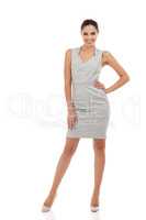 Boss lady and proud. Studio shot of an attractive young woman dressed in smart casual attire-isolated on white.