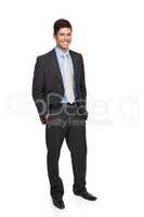 Hes a dapper gentleman. Full-length studio portrait of a businessman in a suit standing against a white background.