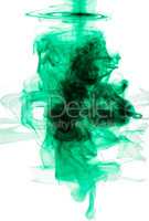 Brilliant green color explosion. Studio shot of green ink in water against a white background.