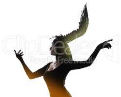 Taking fashion flights of fantasy. Shot of a young woman in a wing-shaped headpiece standing in a studio.