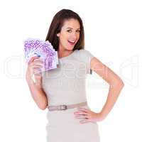 You gotta love payday. Studio shot of a young woman with money to spend.