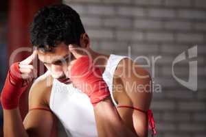 You need to visualise yourself winning. A young fighter mentally preparing before a fight.