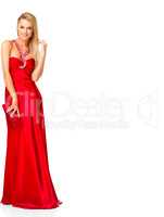 Ready for a night on the town. Full length portrait of an elegant young woman in a beautiful red evening dress on white - Copyspace.