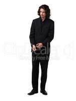 He has style and charm. Handsome young man posing in a black suit - full length.