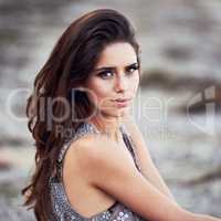 Wild and natural beauty. Portrait of a beautiful young woman wearing a sequinned waistcoat.