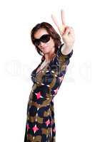 Peace, glamour, style. Attractive woman wearing sunglasses and showing a peace sign isolated on white.