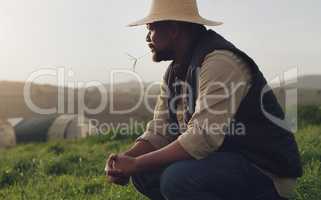 Listen to what the land says. Shot of a mature man working on a farm.