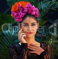 Tropical mystery. Portrait of an exotic beauty in tropical surroundings.