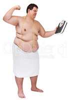 Diet frustration. An overweight young man looking angry and about to punch a weight scale.