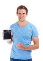 Convenience through technology. Studio shot of a young man holding a digital tablet.