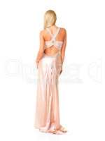 Young blond woman in sexy evening dress on white. Young blond woman in sexy evening dress isolated over white background.