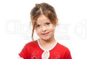 Shy and sweet. Little girl looking shyly at you against a white background.