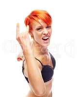 Rock out. A fiery redhead throwing devil horns at you while isolated on a white background.