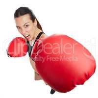 You messed with the wrong woman. High angle portrait of a young female athlete boxing against a white background.