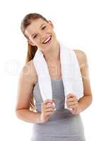 That was a good workout. A teenage girl standing with a towel around her neck after a workout.