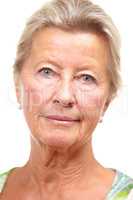 I define my beauty. Studio shot of a mature woman isolated on white.