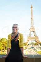 Making holiday memories. An attractive young woman sight seeing in the Paris.