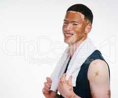 I am unique, I am special, I am me. Cropped portrait shot of a handsome young man with vitiligo working out against a white background.