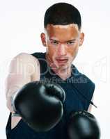 Sacrifice comes before success. Portrait shot of a handsome young male boxer with vitiligo posing in studio.