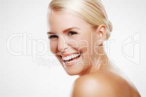Laughter is the best beauty treatment. Studio shot of a laughing blonde woman with copyspace.