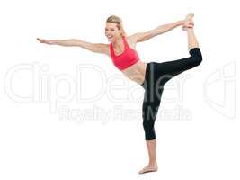 Turn intentions to actions. Studio shot of a young woman doing stretch exercises.