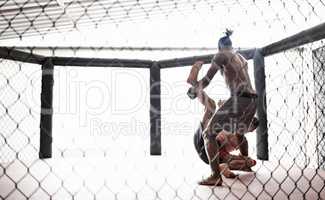 Training for the big day. Two kickboxers in training.