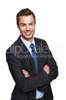 You can trust his financial advice. A handsome young businessman crossing his arms while isolated on a white background.