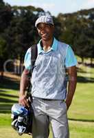 Ready for a round. Shot of a young golf pro ready for a day on the course.