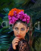 Untamed beauty. A portrait of a beautiful woman wearing a colorful headdress.