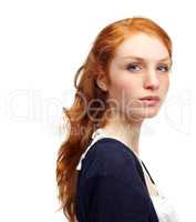 Pensive and fiery. Studio portrait of an attractive redhead isolated on white.